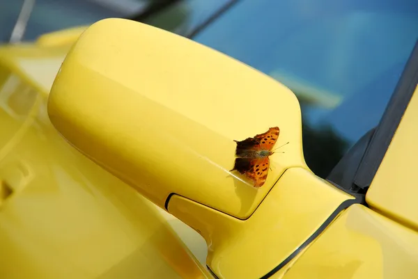 stock image Mirror of yellow sports car