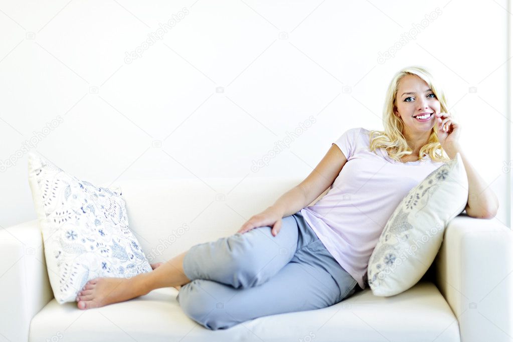 Woman relaxing on couch
