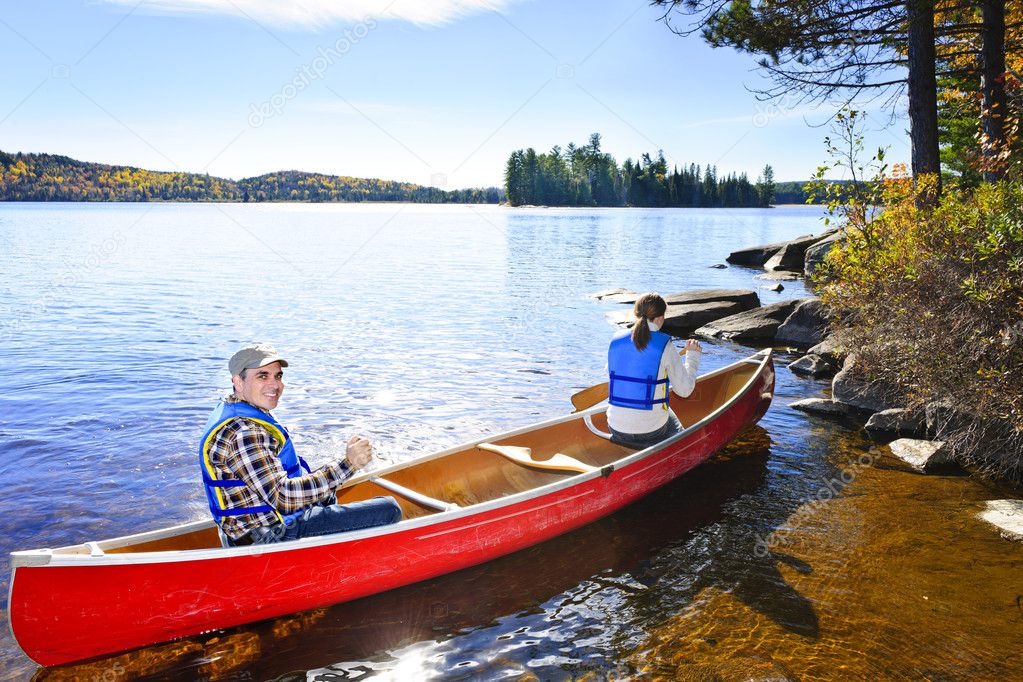 Canoeing near lake shore