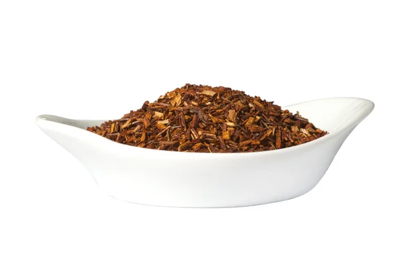 Bowl of loose dry Rooibos red tea, isolated — Stock Photo, Image