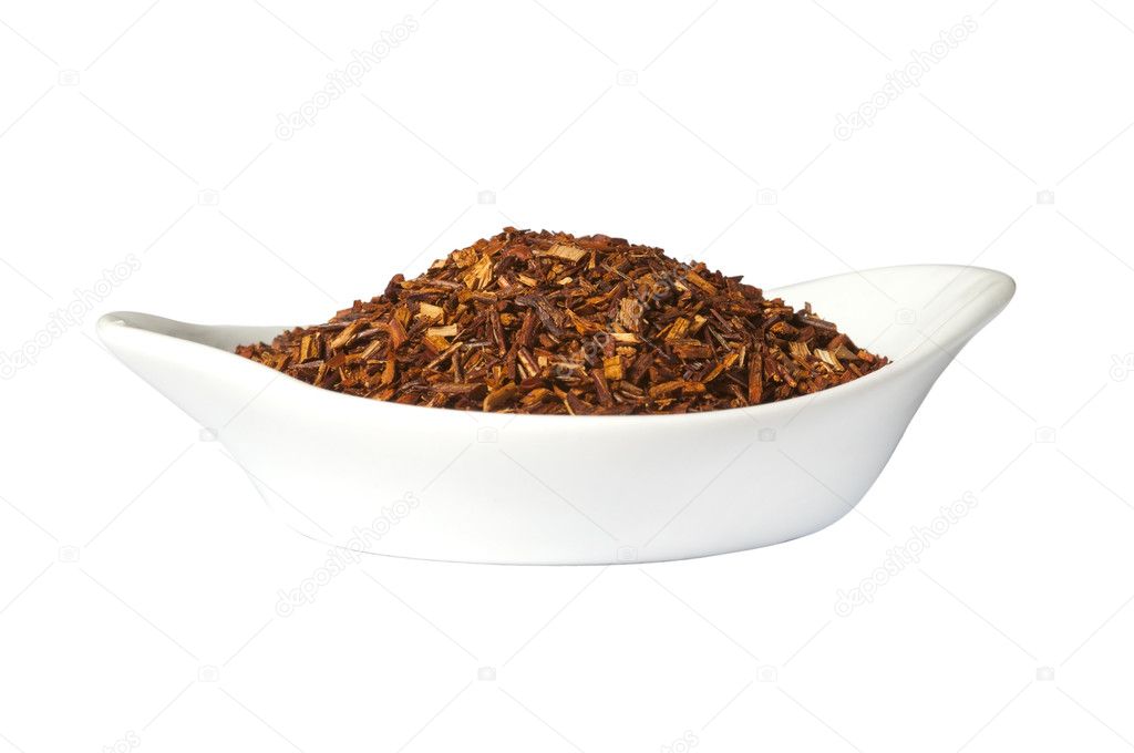 Bowl of loose dry Rooibos red tea, isolated