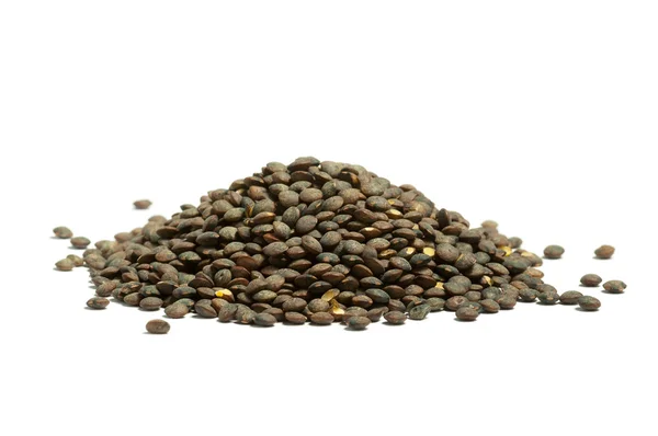 Pilha de lentilhas secas de puy verde francês, isoladas — Fotografia de Stock