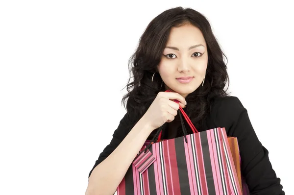 Asiatic young women with shopping bags, isolated — Stock Photo, Image