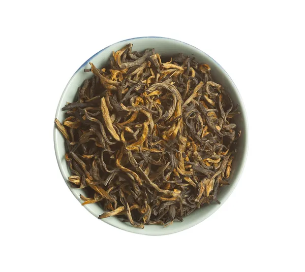 Tè nero foglie di tè secche sciolte, isolate Fotografia Stock
