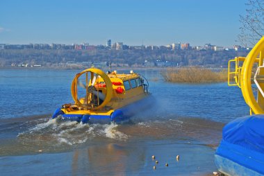 Hovercraft on a river clipart