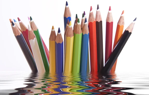 Different coloured pencils with reflection — Stock Photo, Image