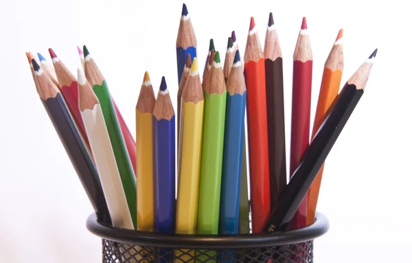 Different coloured pencils stood in pot — Stock Photo, Image