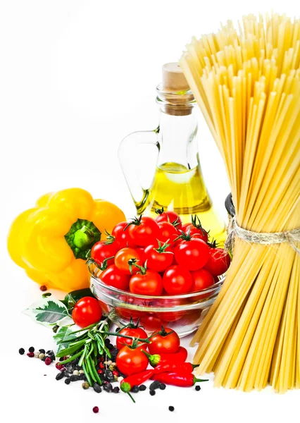 The composition of the pasta and vegetables on a white background — Stock Photo, Image