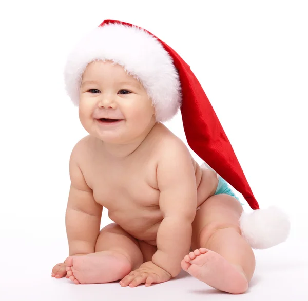 Niño pequeño con gorra roja de Navidad —  Fotos de Stock