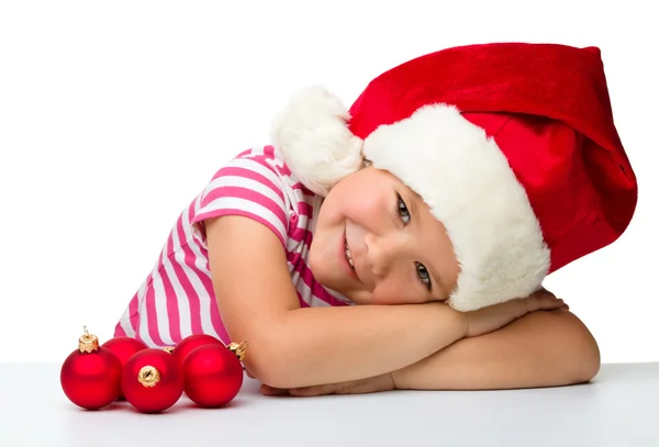 산타 모자를 쓰고 귀여운 소녀 — 스톡 사진