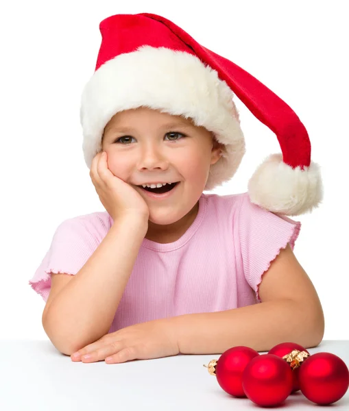 산타 모자를 쓰고 귀여운 소녀 — 스톡 사진