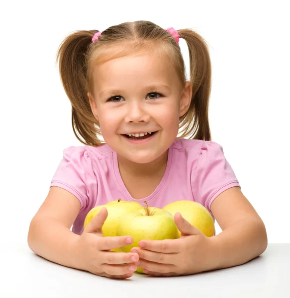 Bambina con le mele — Foto Stock