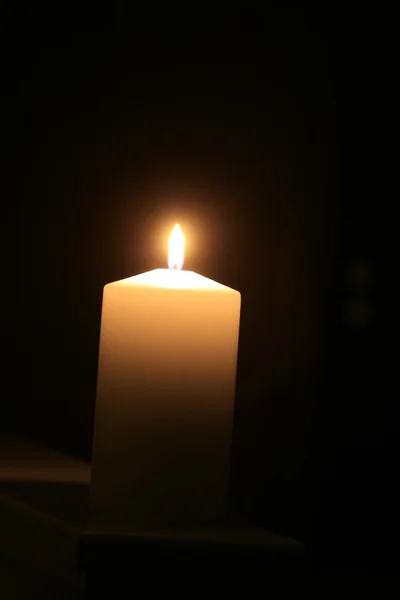 Burning candle, flame light — Stock Photo, Image