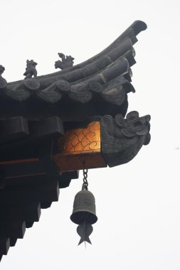 Roof spirits on a roof near the Wild Goose Pagoda, Xian, China clipart