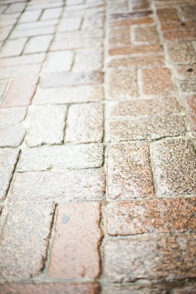 Cobblestone pavimento fundo — Fotografia de Stock