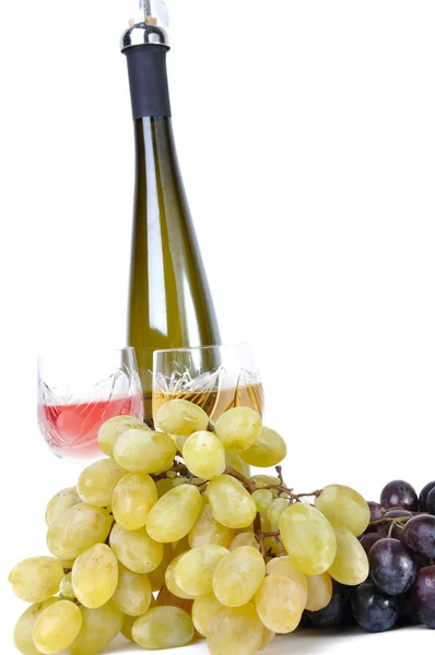 Bottle of wine with aperitive, glasses of wine and grapes isolated in white — Stock Photo, Image