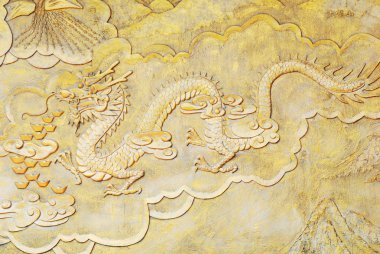 Golden relief of dragon clipart