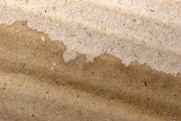 Trockene und feuchte braune Wellpappe Textur — Stockfoto