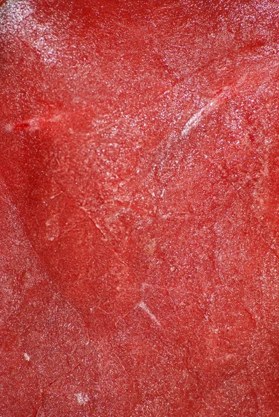 Textura de carne fresca fondo rojo — Foto de Stock