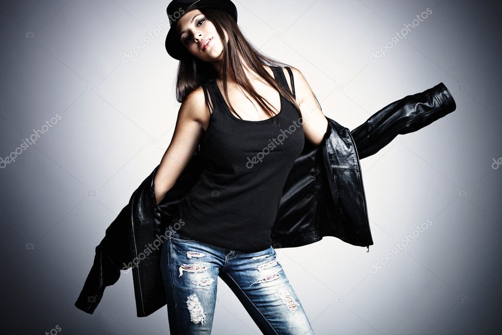 Woman in leather jacket and hat