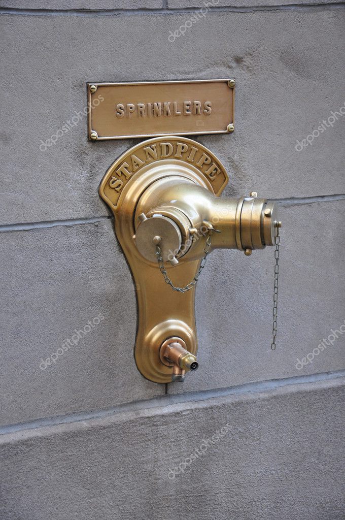 Wall mounted fire Hydrant — Stock Photo © Blufishdesign 7192682