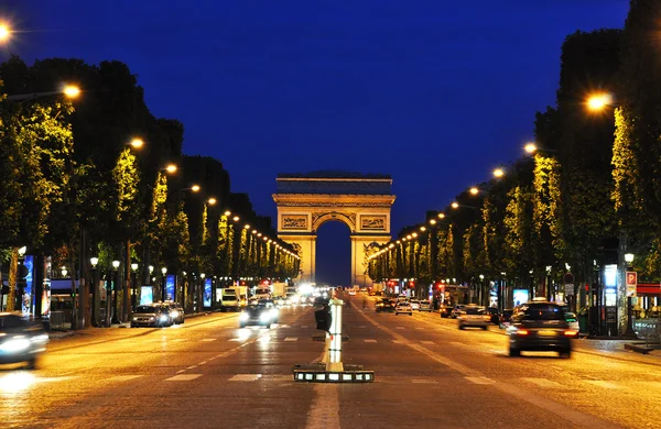 De champs-elysees bij nacht, Parijs — Stockfoto