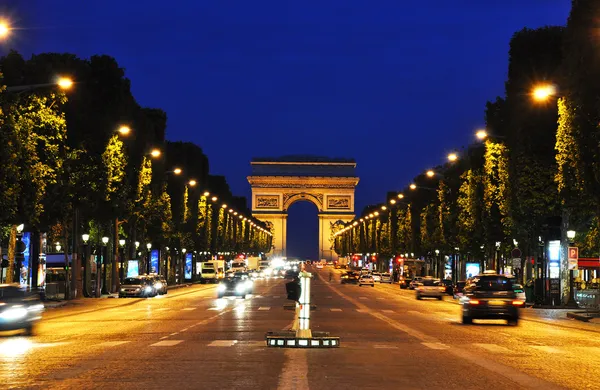 Champs-Elysées på natten, paris Royaltyfria Stockfoton