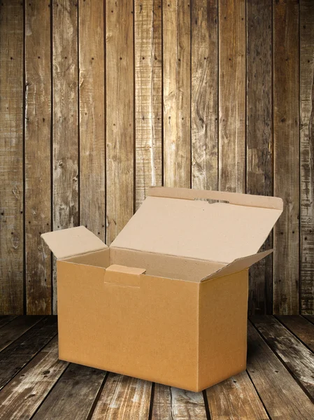 Brown Paper Box on Wood Floor — Stock Photo, Image