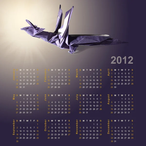 Símbolo del año 2012 - Dragón hecho de papel (Origami) y becerro Imagen de archivo