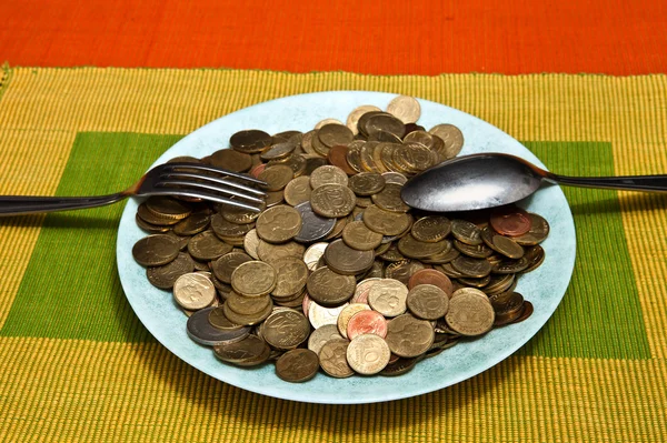 Тарелка денег — стоковое фото
