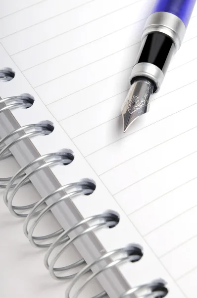 Fountain pen on notebook — Stock Photo, Image