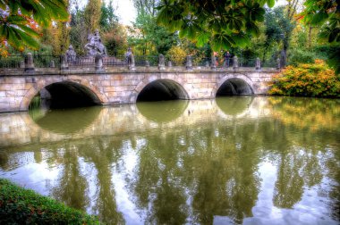 Bridge in lazienki park, warsaw, poland clipart