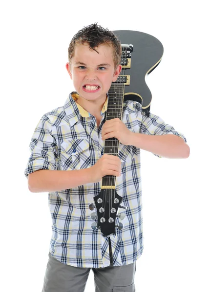 Lite musiker spelar gitarr — Stockfoto