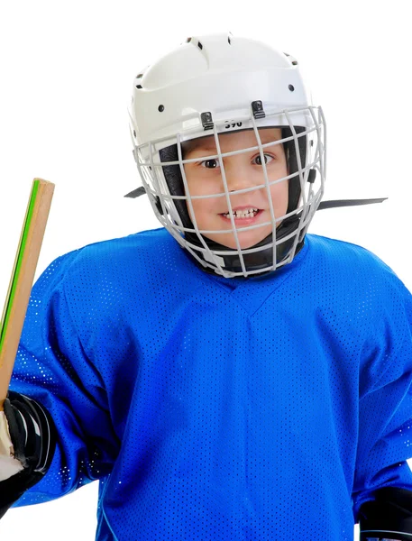 Liten pojke ishockeyspelare. — Stockfoto