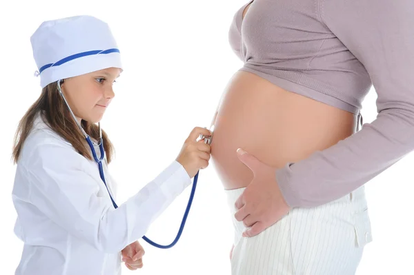 Donna incinta con sua figlia — Foto Stock
