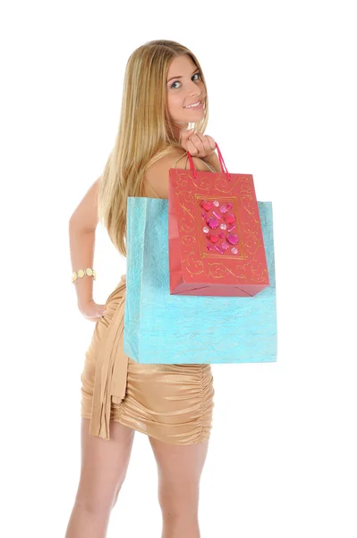 쇼핑백을 들고 있는 아름다운 소녀 — 스톡 사진