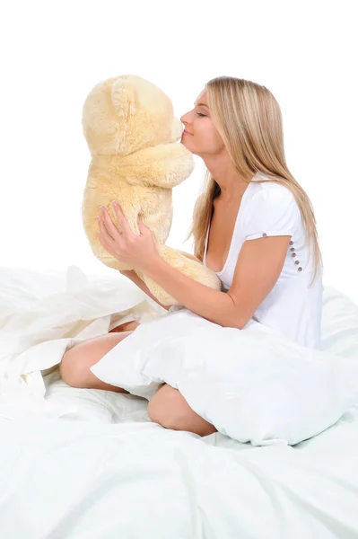 Jeune femme avec ours en peluche — Photo