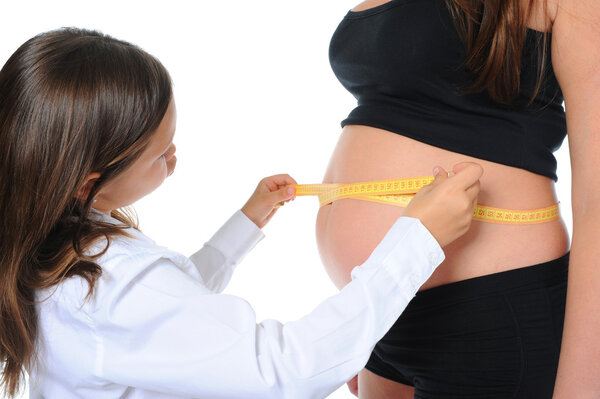 Беременная женщина с дочерью
