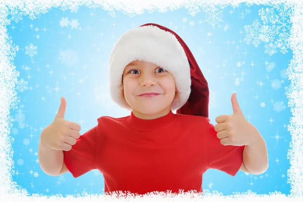 性格开朗的男孩在圣诞老人帽子 — 图库照片