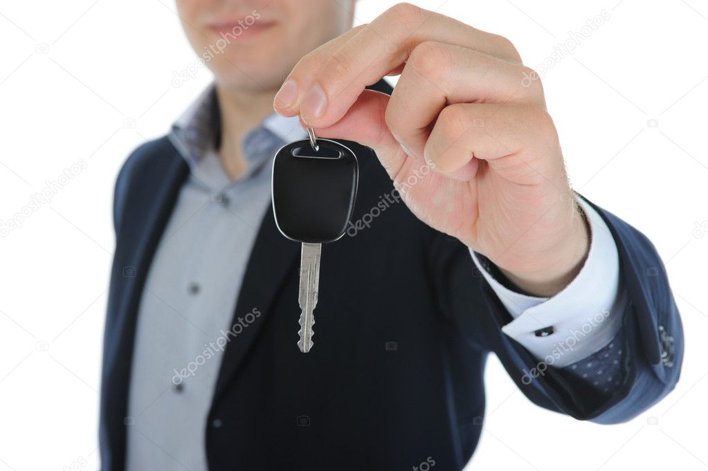 Businessman gives the keys to the car