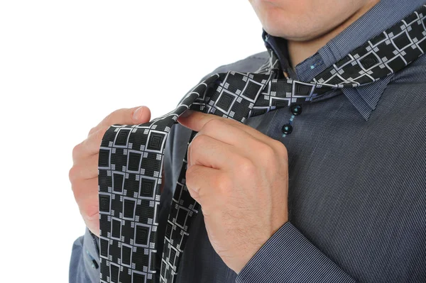 Árukapcsolás a nyakkendőjét üzletember — Stock Fotó
