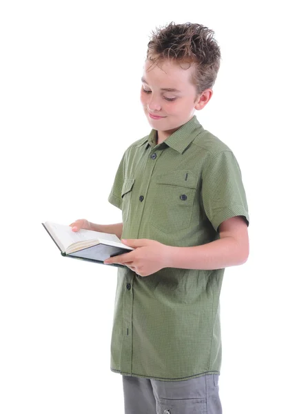 Маленький мальчик держит свою книгу — стоковое фото