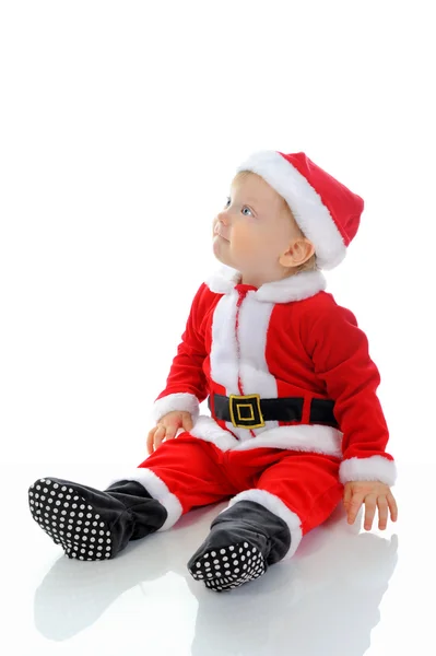 Menino alegre em chapéu de Papai Noel — Fotografia de Stock