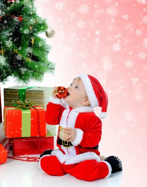 Cheerful boy in Santa Claus hat — Stock Photo, Image