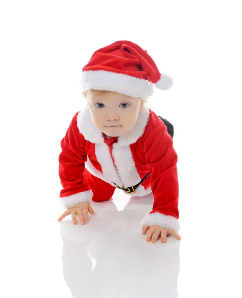 Веселий хлопчика в Санта-Клауса капелюх — стокове фото