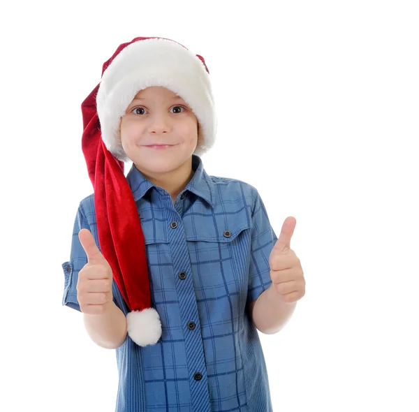 Santa claus kalap vidám fiú Jogdíjmentes Stock Képek