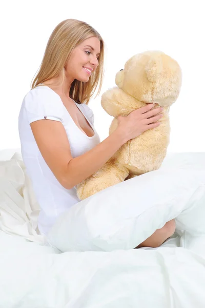 Young woman with teddybear — Stock Photo, Image