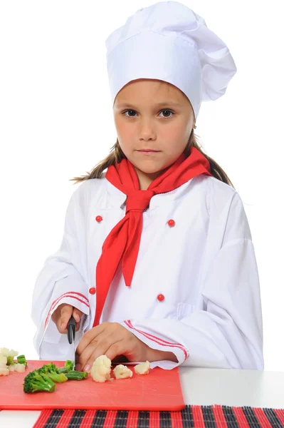 Malý kuchař v uniformě. — Stock fotografie