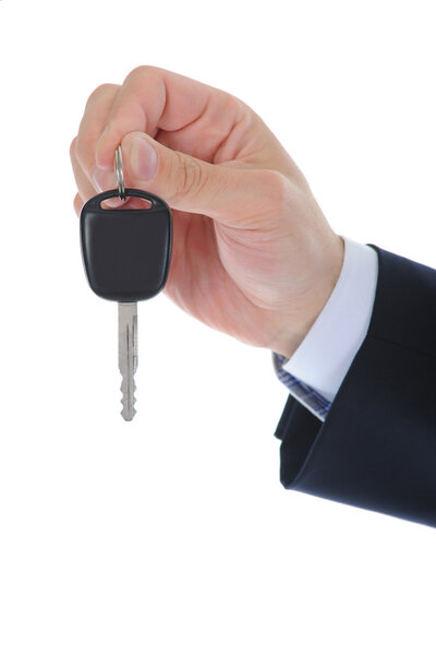 Бизнесмен дает ключи от машины.
