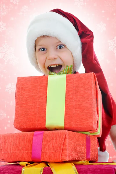 Niño alegre en sombrero de Santa Claus — Foto de Stock